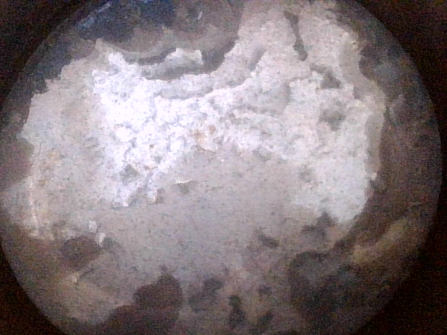 Cylinder 1 piston crown showing normal wear pattern